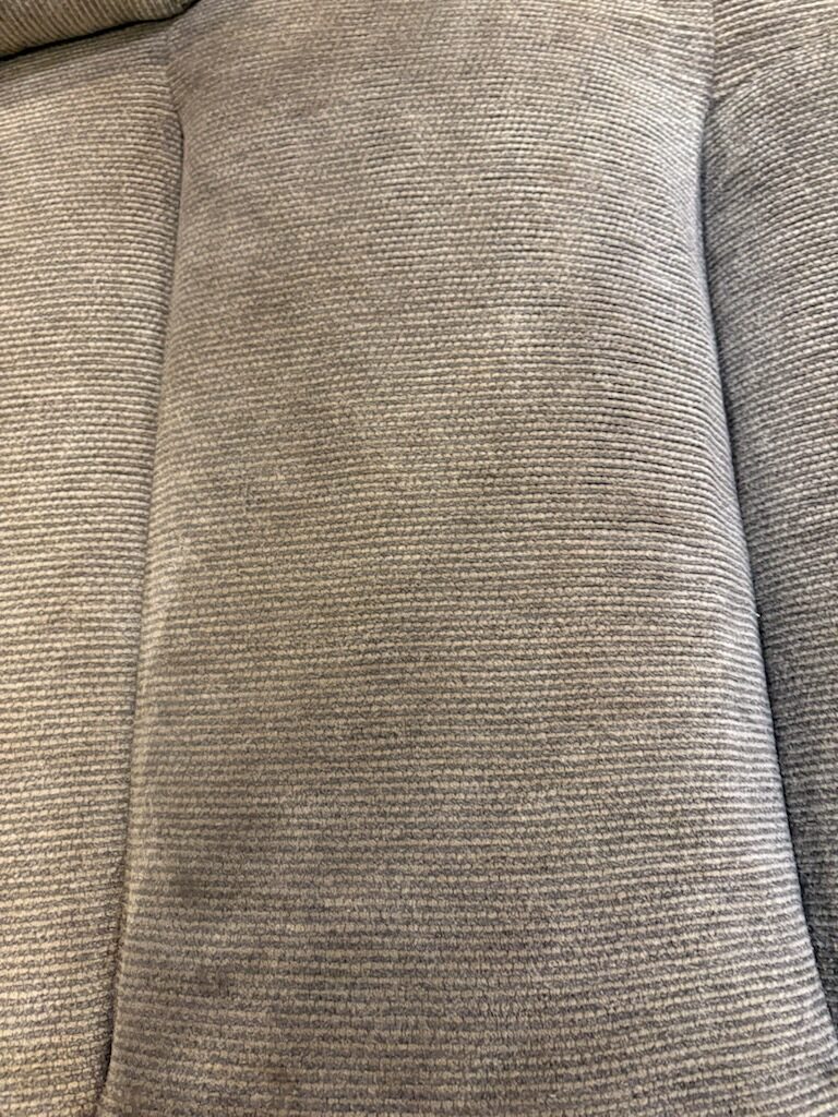 Area rug rolled & ready